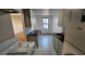 플러싱 아파트 2Bed 1Bath 168가 36Ave. 6층나무 넓은거실과침실 히팅과온수포함 기차역과노던2.5블럭 지하에세탁실 